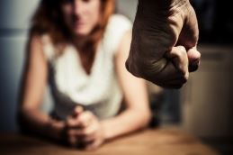 Man’s fist and a woman - is domestic violence a felony in California
